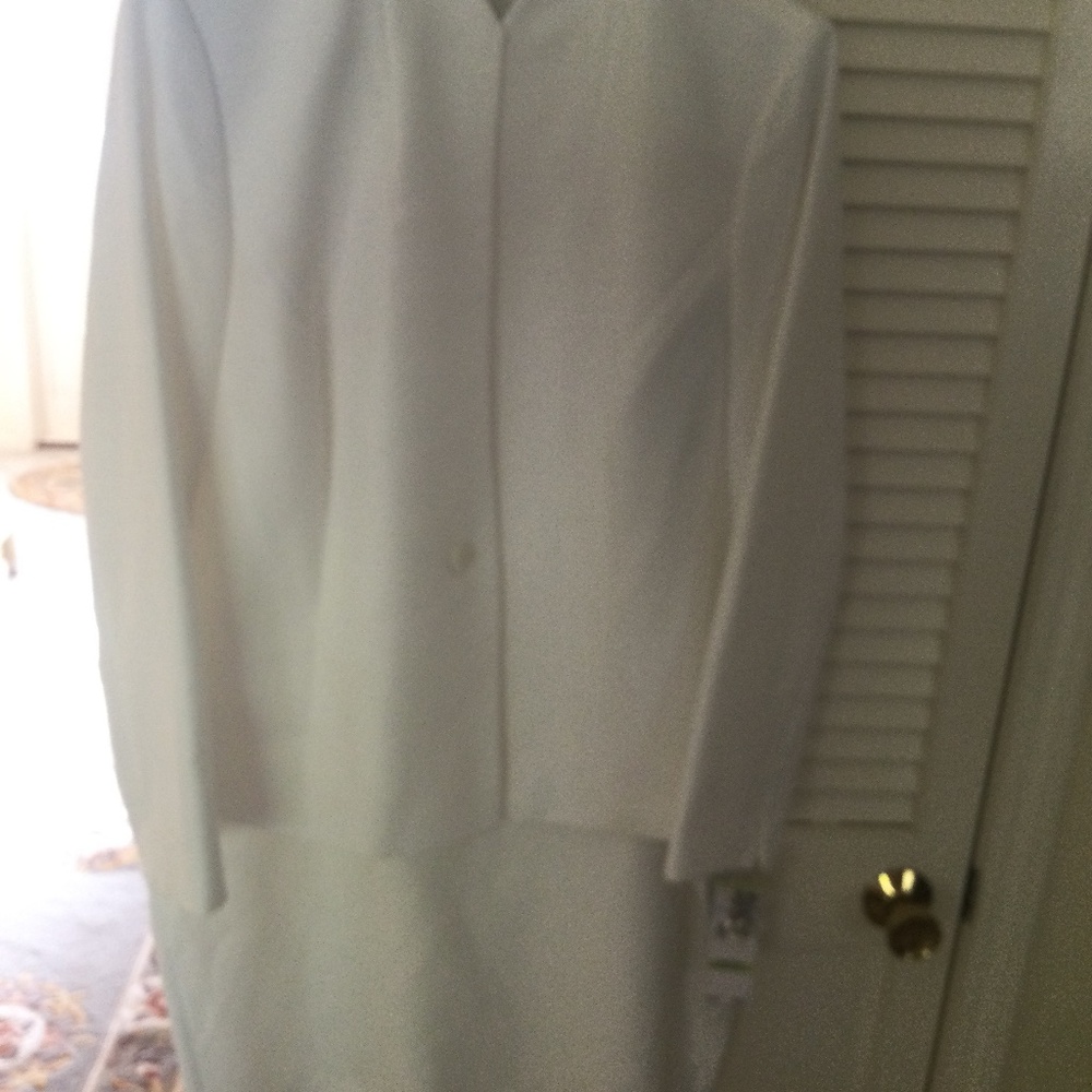 Woman’s beautiful white suit